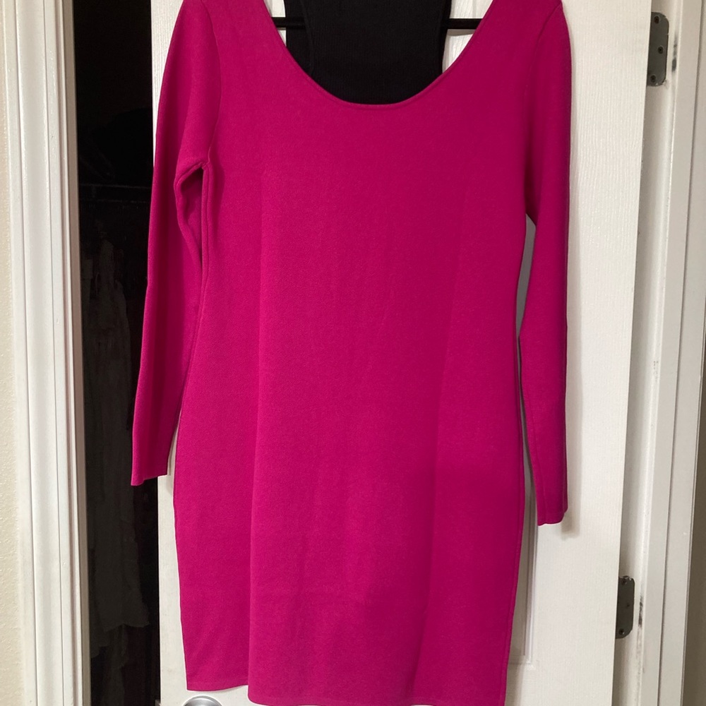 Knee length dress with a one piece tank and cold shoulder.